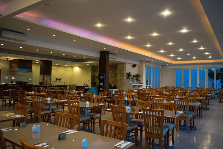 Andriana dining in Theo Sunset Bay Hotel